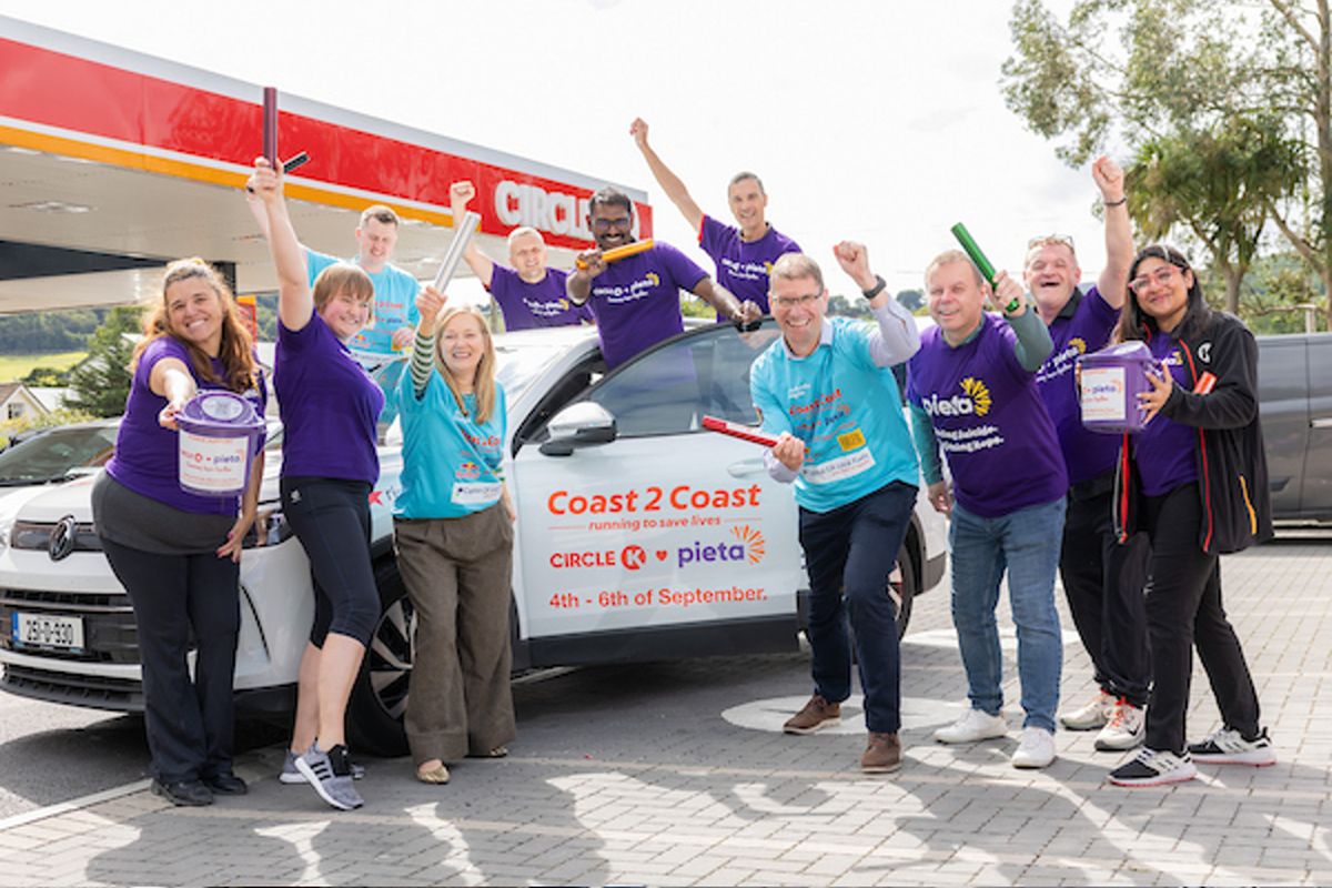 Circle K and Pieta team members gather beside a Coast 2 Coast vehicle ahead of the 2026 relay.